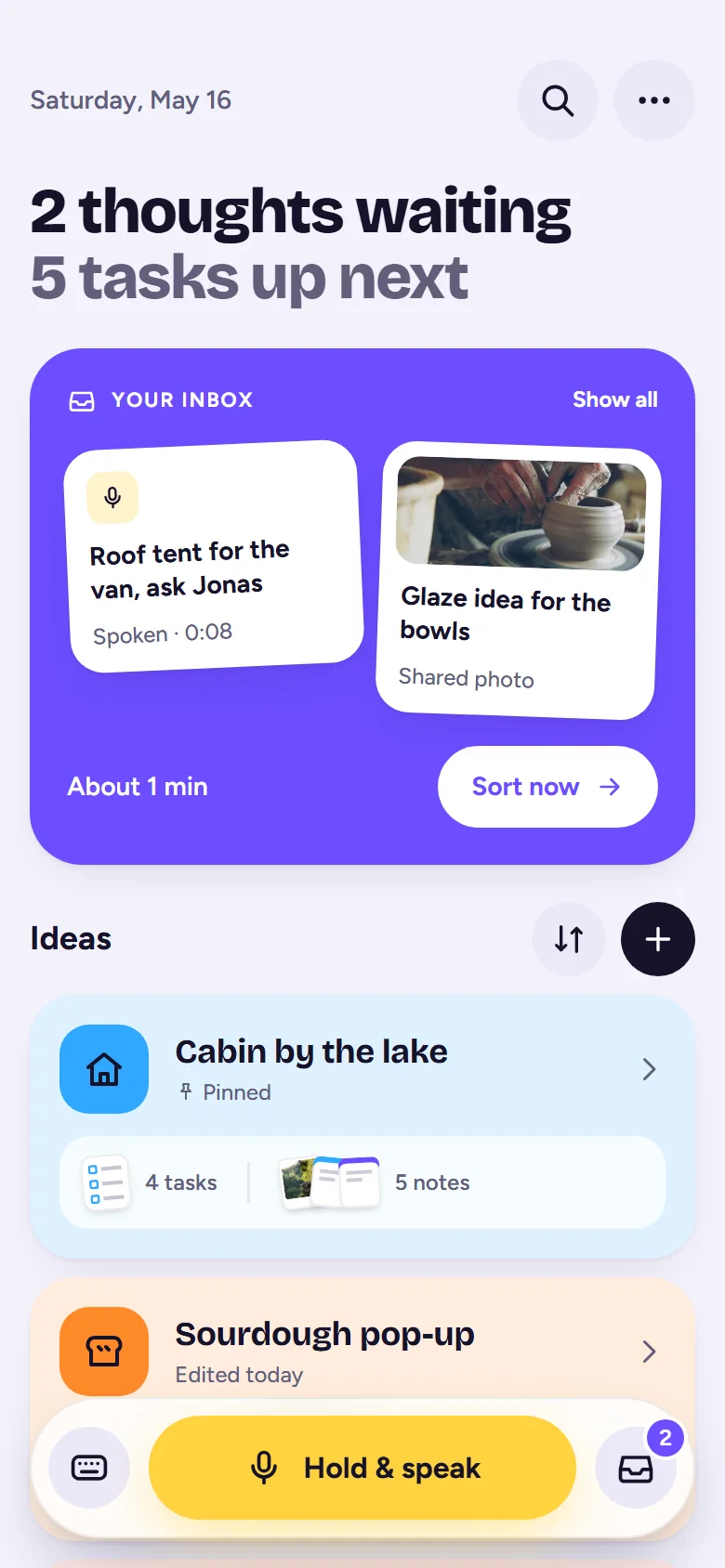 IdeaHive home screen: 2 thoughts waiting in the Inbox, a list of ideas and the yellow Hold & speak button